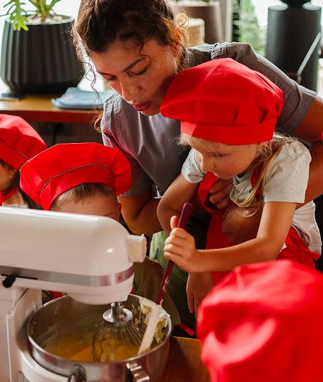 Whisking cream at the kids class