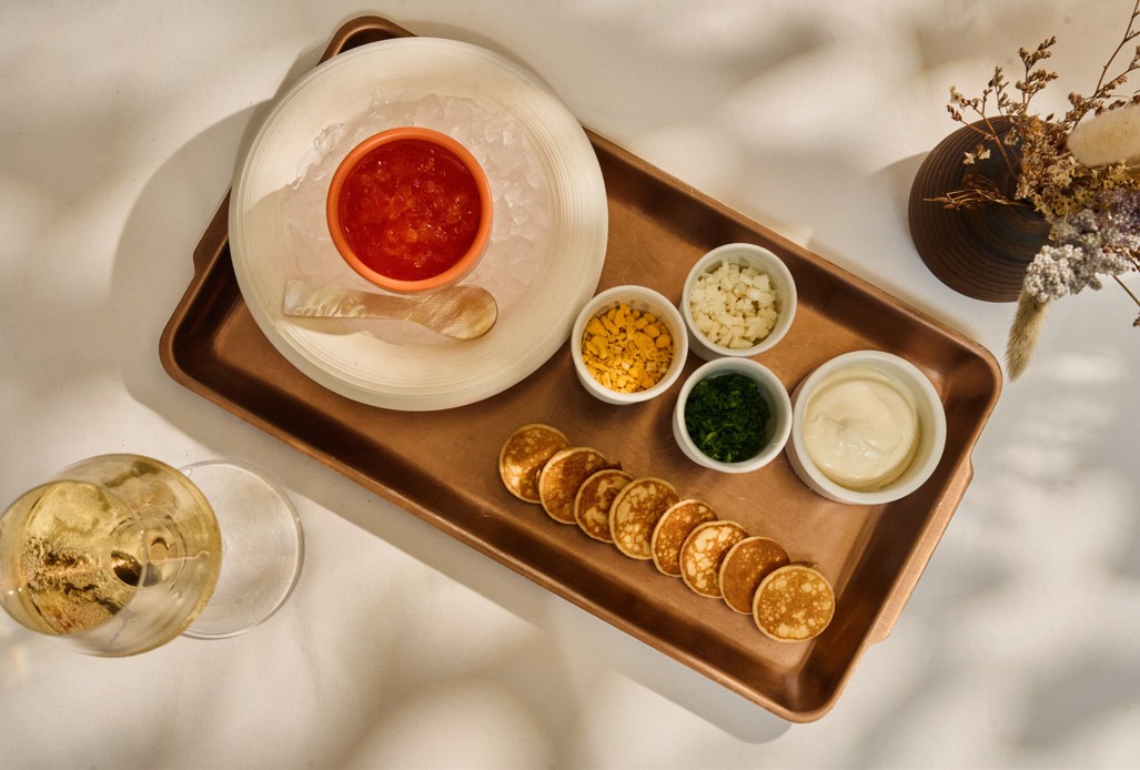 Salmon roe service with blinis at ETNA