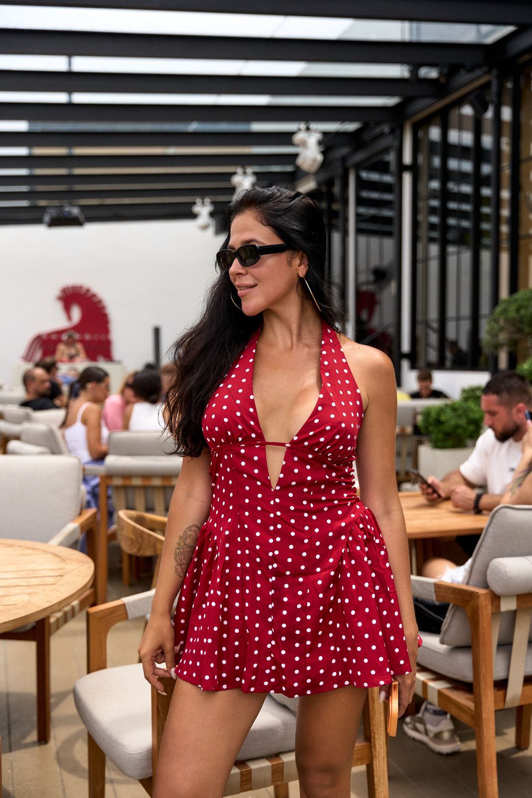 Guest in red on the terrace