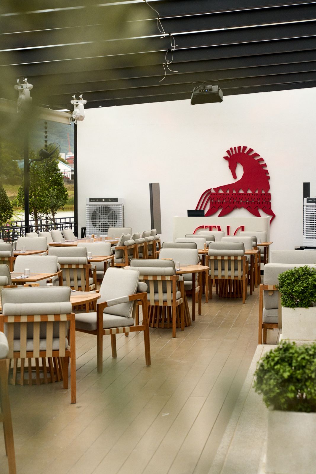 Terrace hall of ETNA with the red horse on the wall